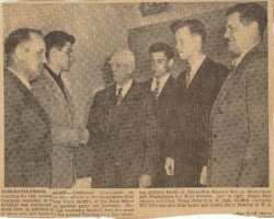 Biff seen standing behind baseball legend and former Washington Senators owner Clark Griffith.