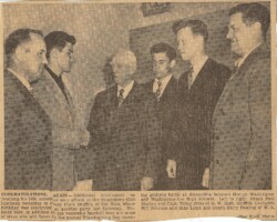 Biff seen standing behind baseball legend and former Washington Senators owner Clark Griffith.