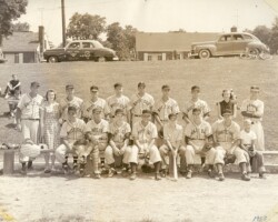 The White Sox on the upper ball field at Yorktown (Greenbrier Park) which is now the football field. It appears to be 27th Street North behind the players.