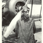 Mr. Marcey in front of bi-plane (c. 1918) (AHS 0331)