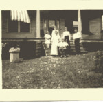 On the porch of the Marcey log cabin home on Glebe Road (AHS 0457)