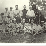 Clarendon Baseball Team in 1920 at the Marcey log cabin (AHS 1930)