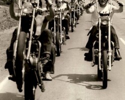 1970 cir Wayne leading his group on Rt 1 with the old Storybook Land parking lot in the background.