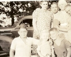 Standing left to right: Claudine and Homer Thomas, Julia Veitch Thomas, and Ned R. Thomas. Kneeling: Harry, Clark and Chip Thomas. Circa 1940.